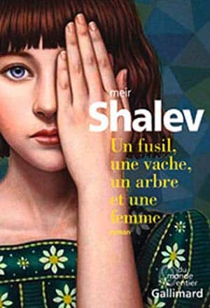 Un fusil, une vache, un arbre et une femme